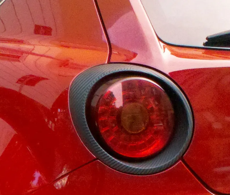 "14 - ITALY - Alfa Romeo MiTo QV - Quadrifoglio Verde sports car (rear light) bright Carbon fibres